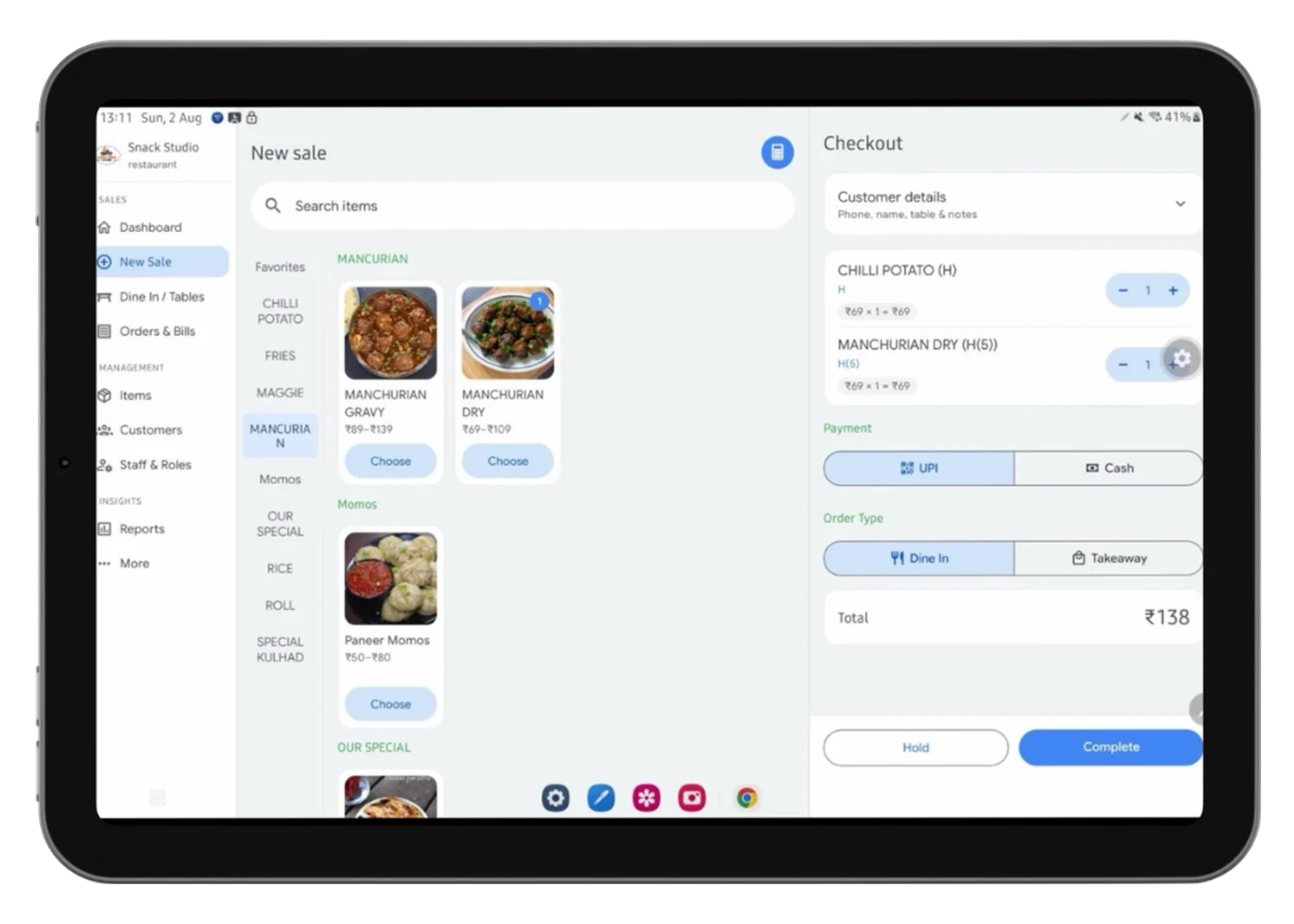 Tokn running on a tablet: a new sale with the checkout panel open, taking payment by UPI or cash